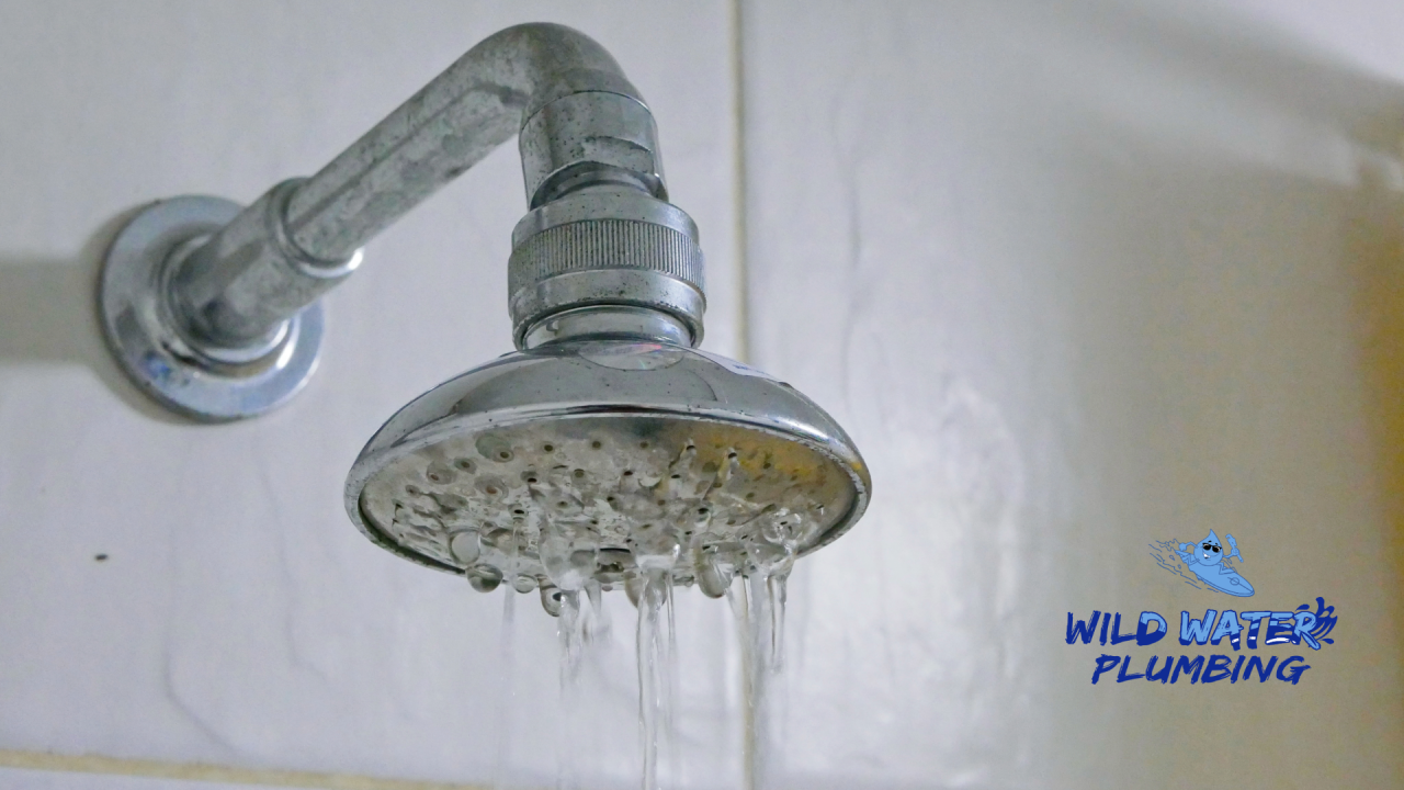 low water pressure, plumbing leaks, clogged pipes, corroded pipes, pressure regulator, municipal water supply, water heater sediment, pipe sizing, showerhead clog, water pressure diagnosis