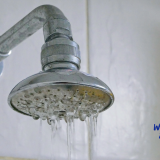 low water pressure, plumbing leaks, clogged pipes, corroded pipes, pressure regulator, municipal water supply, water heater sediment, pipe sizing, showerhead clog, water pressure diagnosis